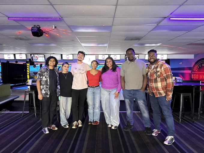 7 people in bowling alley
