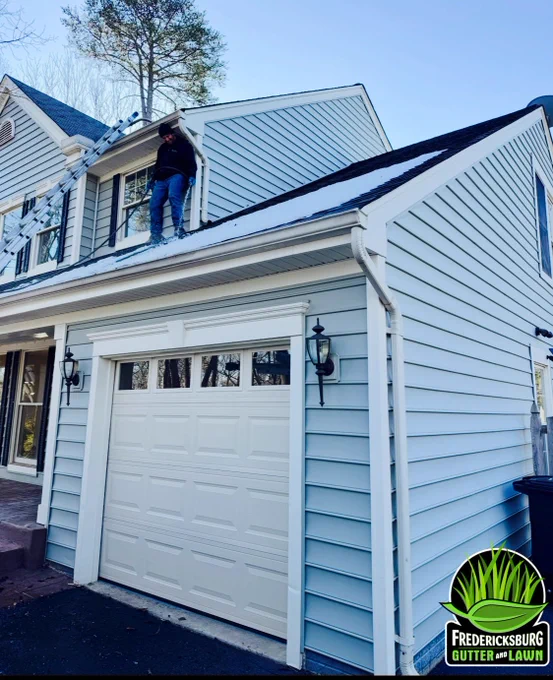 Jeffrey E. Porter cleaning clogged gutters and gutter guards in Stafford, Virginia