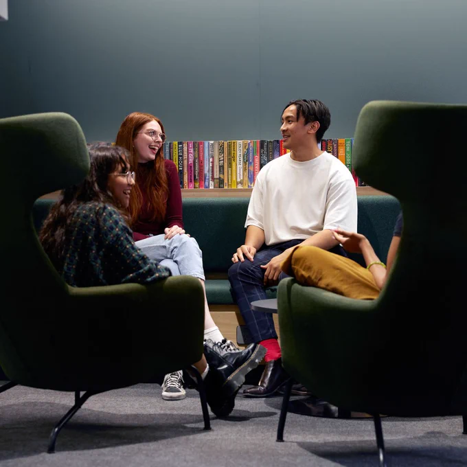 A group of students socialising in the Curtin University Library