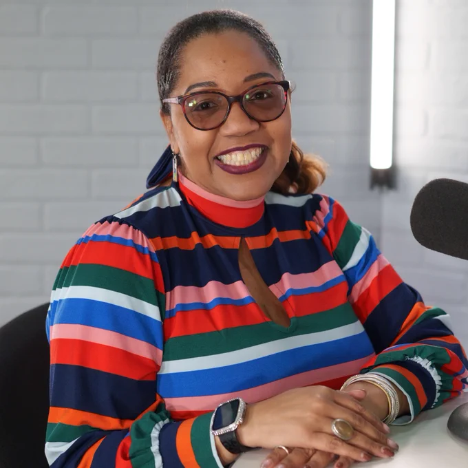 Meika Fallon, a second-year teacher, smiles on the Talks With Tyler ISD podcast set.