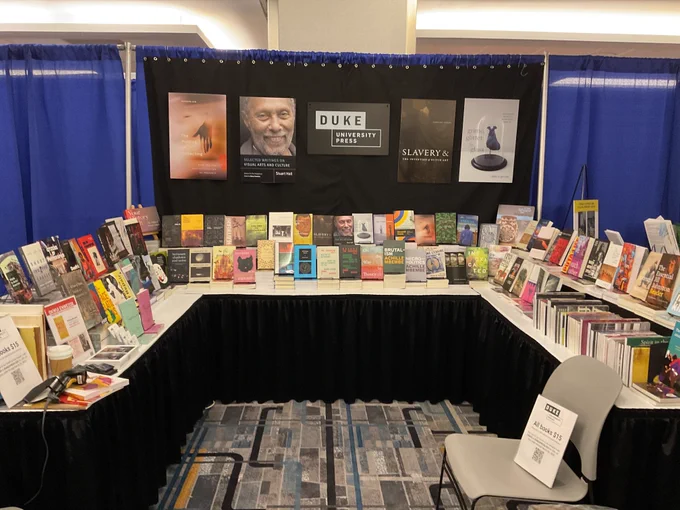 The DUP booth has posters recognizing new books, The Politics of Collecting, by Eunsong KIm, Stuart Hall’s Selected Writings on Visual Arts and Culture, edited by Gilane Tawadros, Slavery and the Invention of Dutch Art, by Caroline Fowler, and Grime, Glitter, and Glass, by Nikki A. Greene. There are also dozens of books and journals on display and for sale.