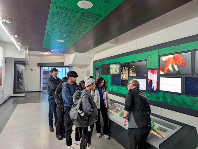 Students on a tour with a museum interpreter