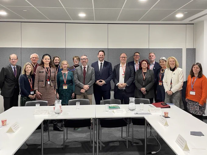 Simon pictured with a group of stakeholders at the round table event.