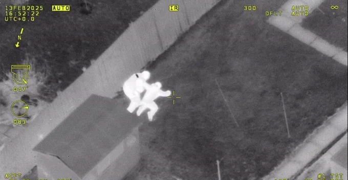 Thermal image of person being arrested. 
