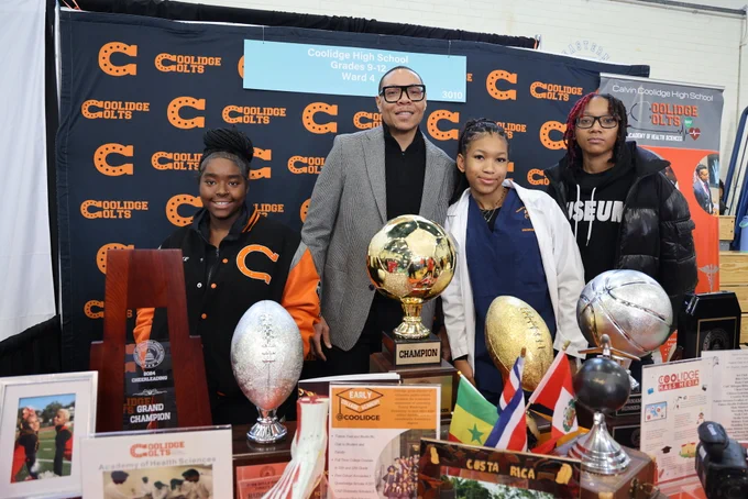 Chancellor Ferebee poses with members from the Coolidge High School community.