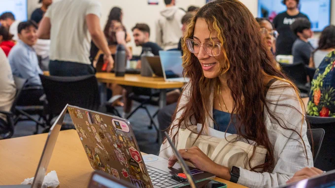 woman looking at a laptop