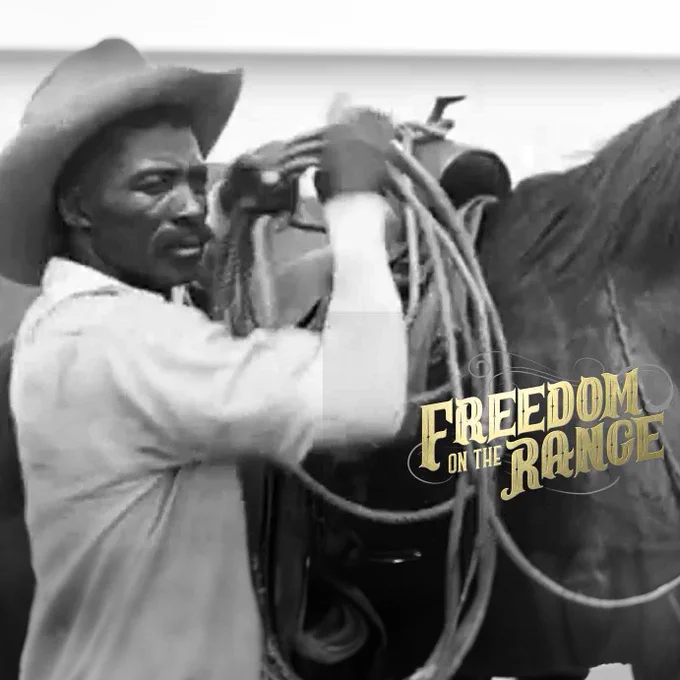 Bass Reeves, a former enslaved man who became a legendary lawman in the American West, often considered one of the first Black deputy U.S. Marshals, and whose story is often highlighted in documentaries or shows focused on the contributions of Black cowboys, like "Freedom on the Range" which celebrates the experiences of Black cowboys in the frontier, cares for his horse in photo of him in profile wearing a cowboy hat and white shirt as he readies to tether his horse.