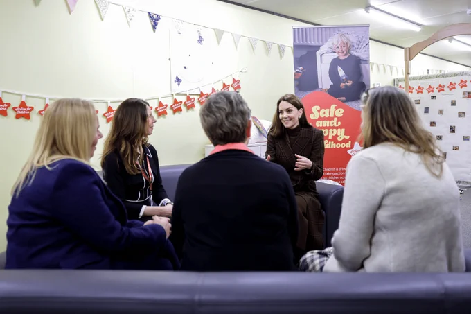 The Princess of Wales engages in a discussion with staff at HMP/YOI Styal. 