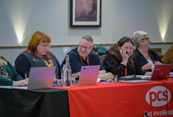 Image of the speakers at the top table 