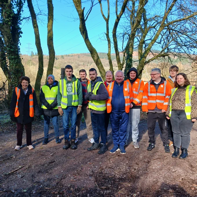looking pretty happy on our walk around the water treatment centre , in our bright orange and yellow Dwr Cymru visibility vests