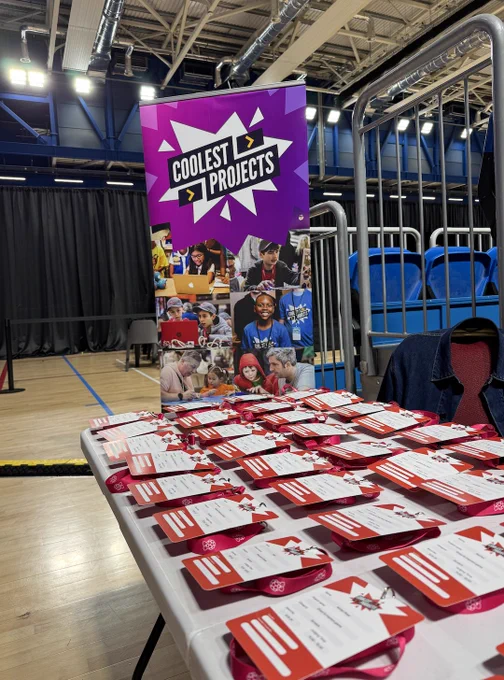 A coolest projects banner with lots of lanyards ready for young creators
