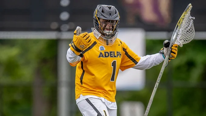 Dylan Renner in full lacrosse uniform, on the field