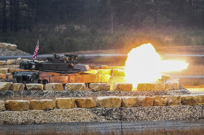 An American M1 Abrams fires a round during the defensive live fire as part of the U.S. Army Europe and Africa International Tank Challenge at 7th Army Training Command’s Grafenwoehr Training Area, Germany. The USAREUR- AF International Tank Challenge builds tactical skills and enhances esprit de corps across the 11 teams from five participating allied and partner for peace nations. 