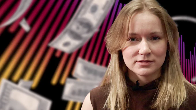 Young woman looks at the camera with a graphic showing money floating in the background