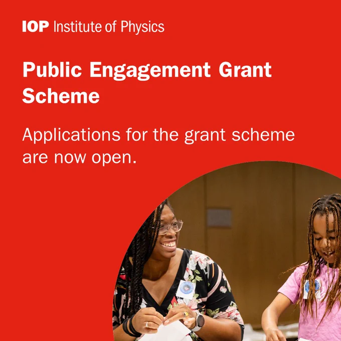 Promotional image for the Institute of Physics Public Engagement Grant, featuring two individuals engaged in a science experiment, smiling as they work together.