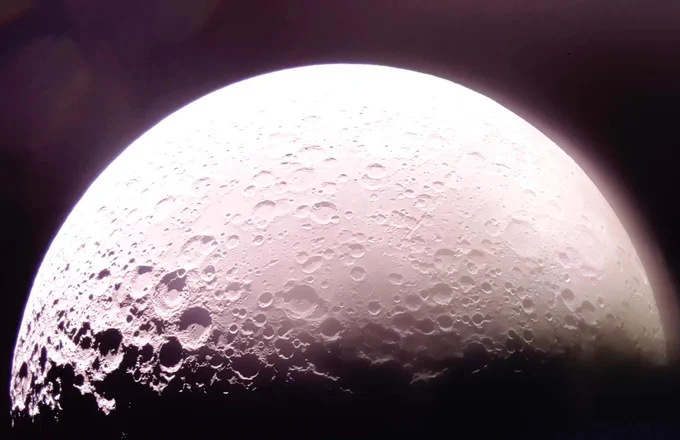 Firefly’s Blue Ghost lunar lander captured a bright image of the Moon’s South Pole (on the far left) through the cameras on its top deck, while it travels to the Moon. The Moon has a bright white glow at the top of the image. On the left, a heavily cratered area (the South Pole) is visible. Credit: Firefly Aerospace