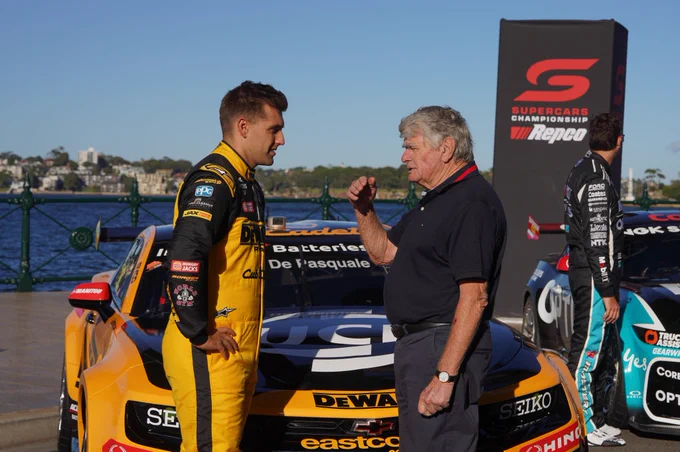 Team 18 driver Anton de Pasquale, left, chats with Hunter’s Hill-based motorsport legend, Colin Bond, during the 2025 Supercars season launch on the Sydney Harbour Bridge on Sunday, February 16, 2025. TWT On-the-Spot PHOTO (Michelle Haywood)