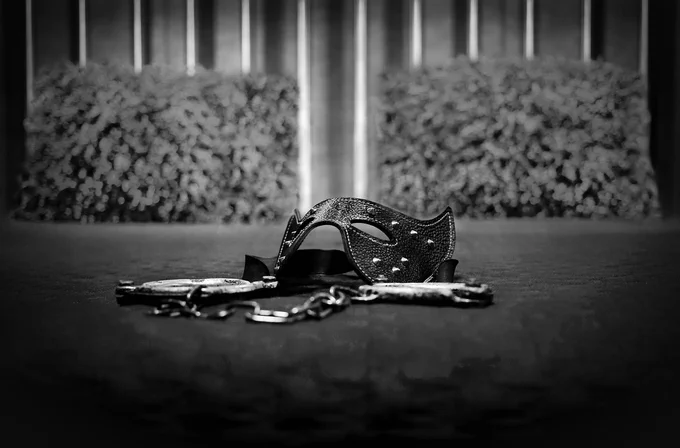 Mask and handcuffs