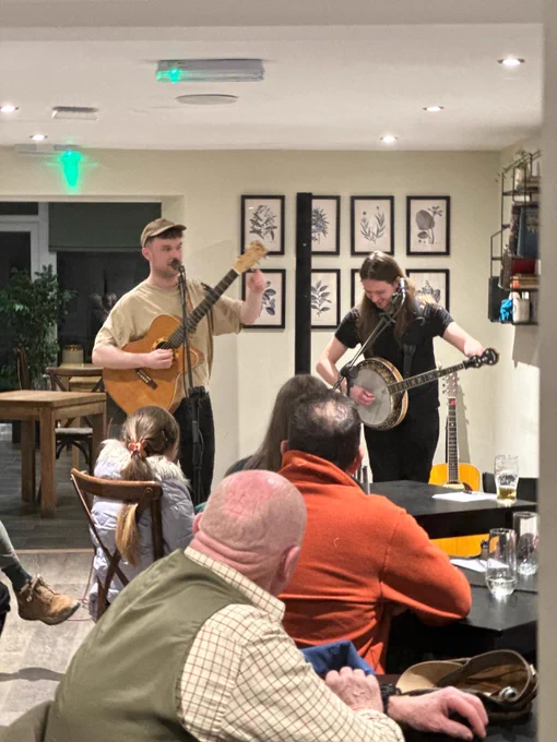 Sam and Jamie play a live set in the pub.