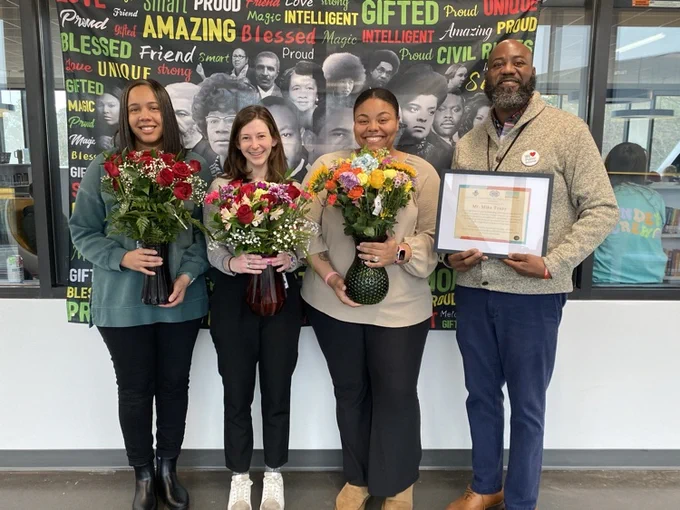 From the left: IA of the Year, Ms. Morrison, Beginning Teacher of the Year, Ms. Reeb, Teacher of the Year, Ms. Owens, and Employee of the Month, Mr. Truzy