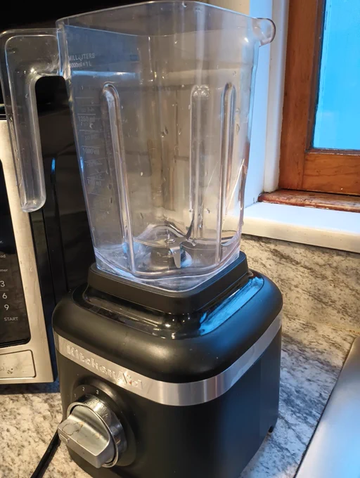 Blender. The flask has a hole on it. 