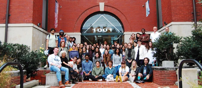 Group photo of faculty and students outside of the WAAC building in Alexandria, VA