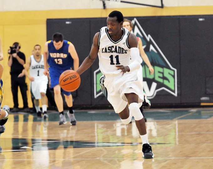 Cascades legend Kevon Parchment runs and dribbles a basketball during a game vs. Lethbridge in 2013.