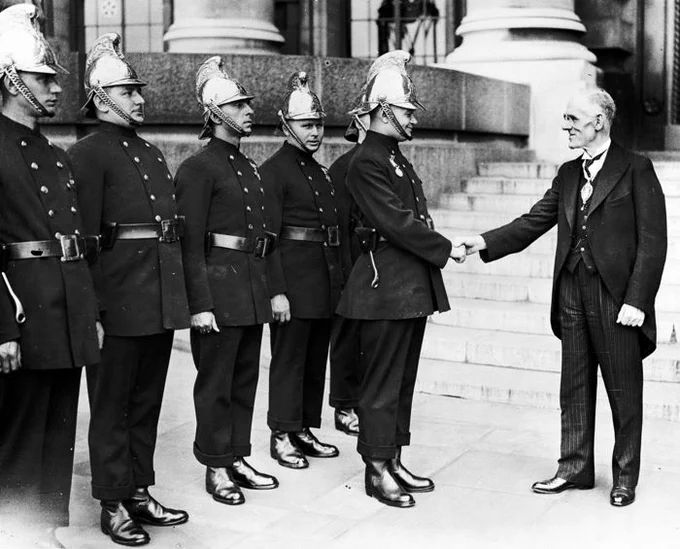 London Fire Brigade firefighter, James W Roots receiving the Silver Gallantry Medal in 1936 for ‘extraordinary bravery’. Presented by Chairman of the London County Council