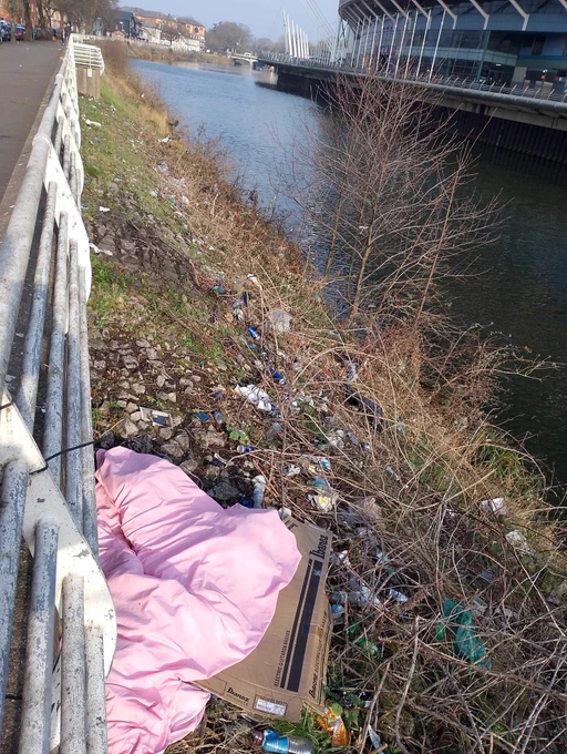 Rubbish on the banks of the Taff before the clean-up.