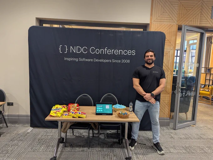 Jakob representing NDC Conferences, stood by their stand at #DDDNorth.