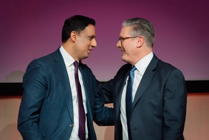 Photograph of Keir Starmer with Anas Sarwar on stage during Scottish Labour Conference.