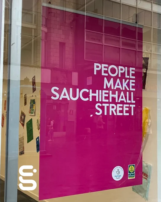 A pink poster that reads "People Make Sauchiehall Street"