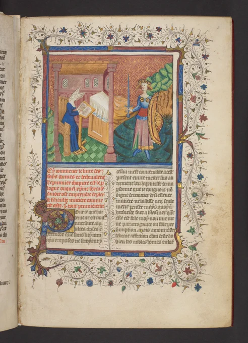 An illustration of Christine de Pizan, writing in her study before the goddess Minerva. 