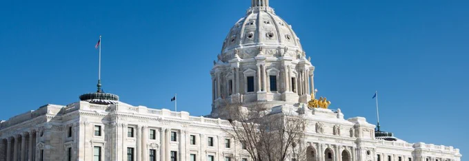 Minnesota State Capitol building with a bright blue sky.