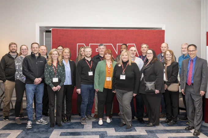 10 women and 10 men in a photo.