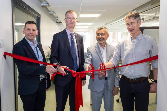 A red ribbon is cut at the opening ceremony of the University of Glasgow's new medical magnetics research facility