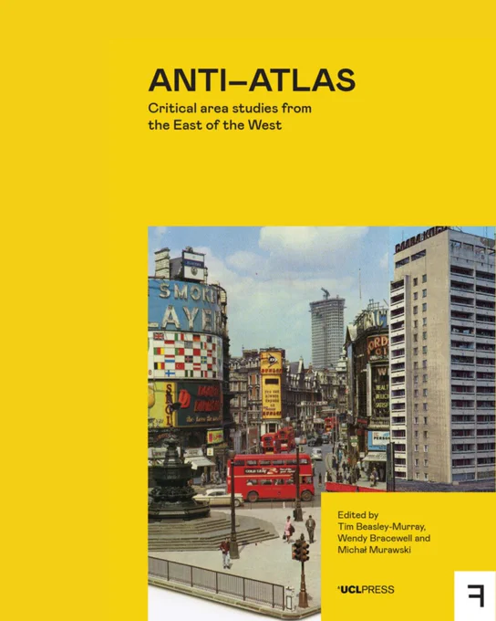 Cover of the book Anti-Atlas: Critical Studies from the East of the West, featuring a vibrant cityscape with towering buildings and bustling streets with traffic and billboards.