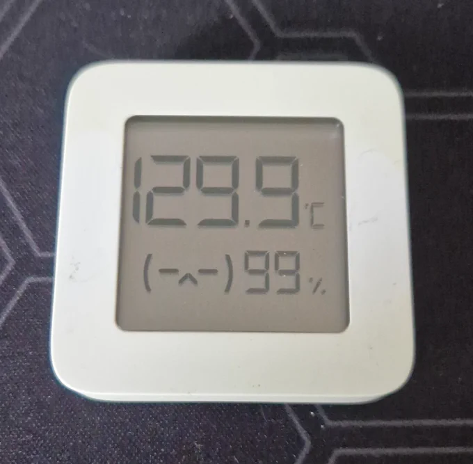 A temperature sensor reading 129.9 degrees celcius and 99% humidity.