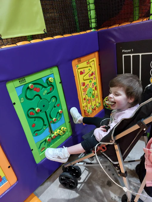 Girl in wheelchair in soft play at High Rise Lisburn