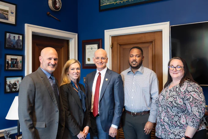 Seattle CARE Department Chief Amy Barden, Seattle Police Department Deputy Chief (Retired) Eric Barden, CARE Deputy Chief Charlotte Joseph and Strategic Advisor Davonte Belle, visiting U.S Congressman Adam Smith at U.S. Capitol House of Representatives.
