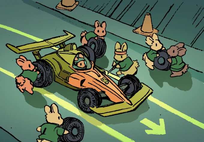 A bunny in a carrot-colored racecar makes a quick stop for repairs. A crew of other bunnies zoom in with new tires and also a screwdriver. It is the middle of the race. They are all out of sync, and not organized like a real pit-crew.