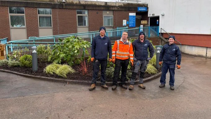 A photos of workers outside the ward.