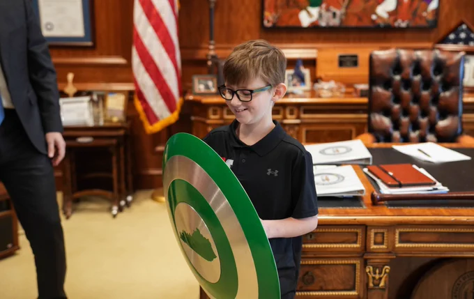 An image of Seth Walsh in the Governor's office.