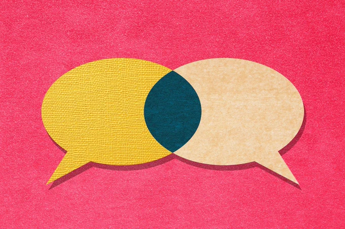 Two speech bubbles - one in yellow and one in beige - overlap to form a dark center. The background is bright red.