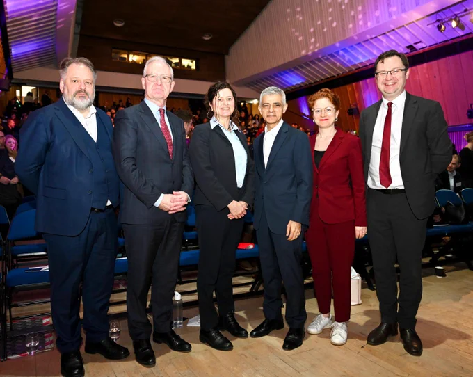 A photo of Deputy Mayor for Business, Howard Dawber, President of Imperial College London Hugh Brady, Chair of London Councils Cllr Claire Holland, Mayor of London Sadiq Khan, CEO of London & Partners Laura Citron, and Alex Norris MP, Minister for Building Safety and Local Growth, taken at the launch event of the London Growth Plan.