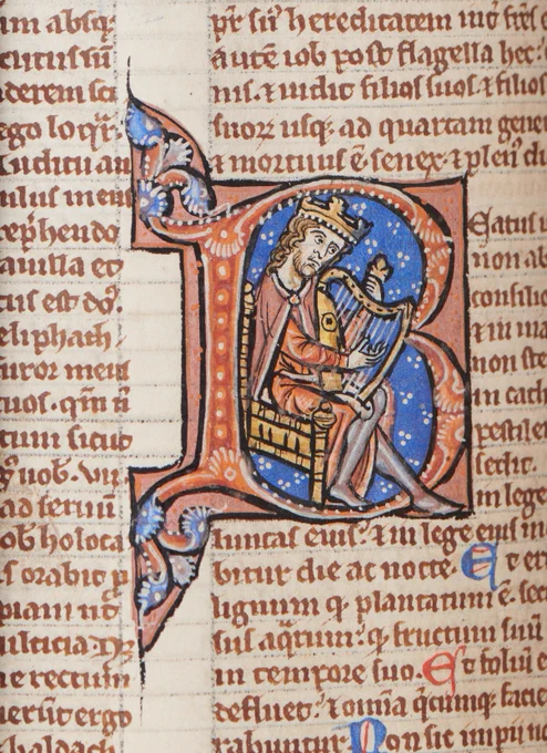 Historiated capital - the letter B with a miniature figure of King David playing his harp (folio 259 v. Psalm 1). Image by Linda Sayce and courtesy of Salisbury Cathedral.