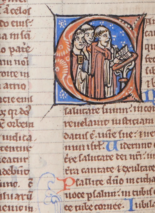 Detail of initial C with priests singing at a lectern (folio 277 v. Psalm 97). Image by Linda Sayce and courtesy of Salisbury Cathedral.