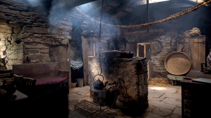 View of main hearth and living area inside Kirbuster Farm Museum, Orkney