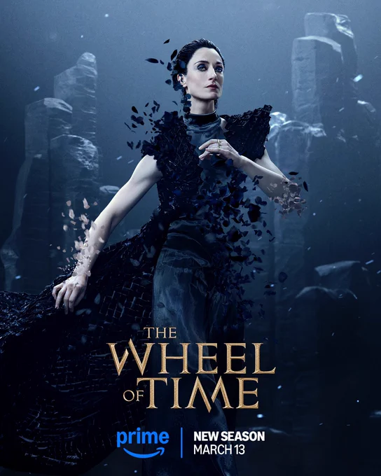 A poster of Lanfear (Natasha O'Keeffe) in The Wheel of Time Season 3. Her body and garments are beginning to dissolve. The Wheel of Time logo is center at the bottom of the image, with the Prime Video logo beneath and text reading: “New Season March 13”.