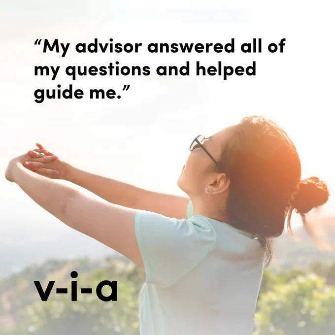 woman with back slightly turned stretching arms out against blurred nature background with text: "my advisor answered all of my questions and helped guide me."